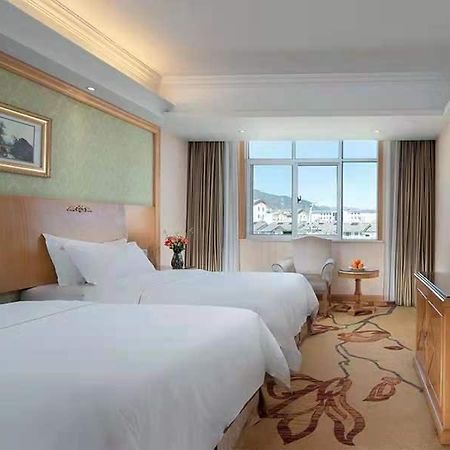 Vienna International Hotel Lijiang Yuxue Avenue Eksteriør billede